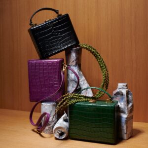 Three Brandon Blackwood signature handbags