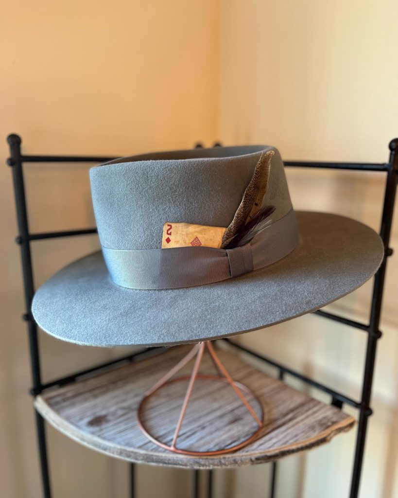 a grey fedora from No Man Hat Co a black owned hat company