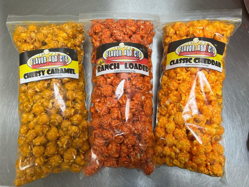 Flavor Addicts Cheesy caramel, ranch loaded, and classic cheddar popcorn bags