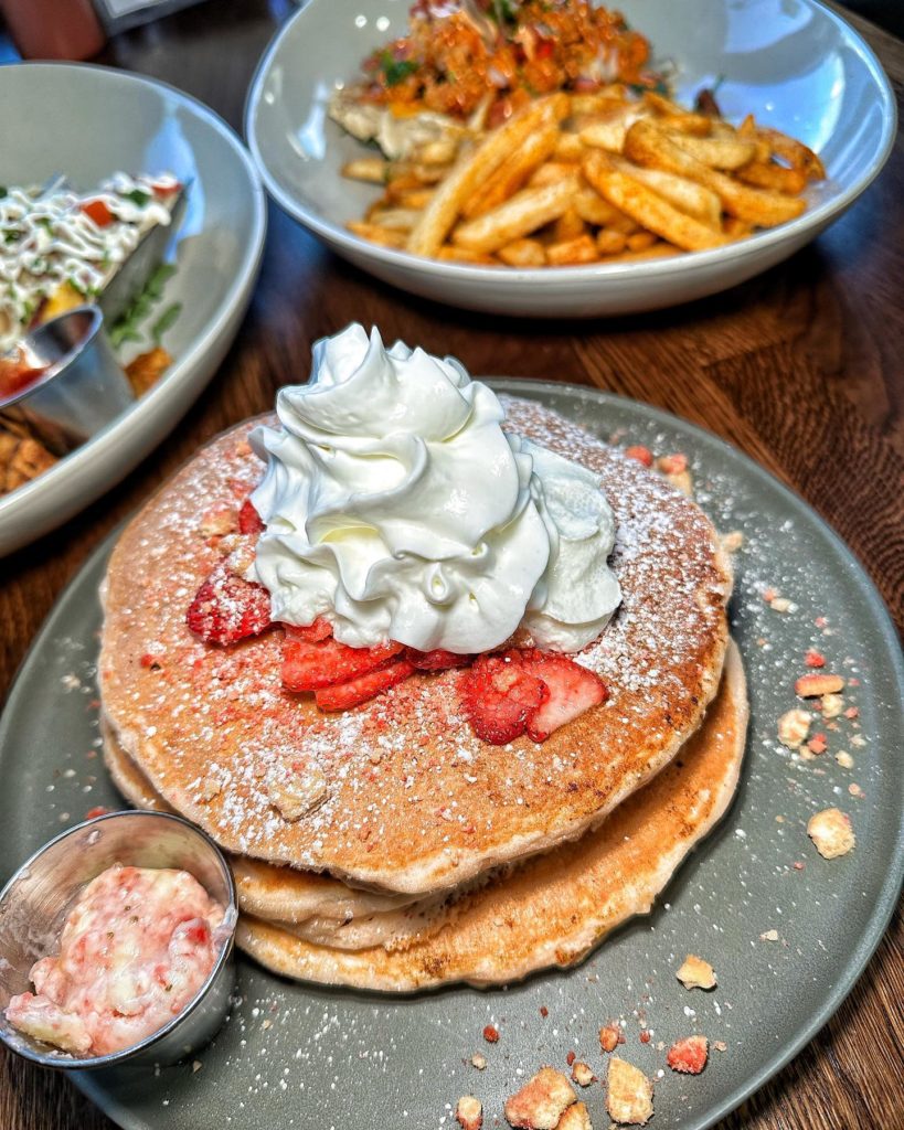 strawberry shortcake pancakes on a plate for brunch at LA restaurant The Court Cafe
