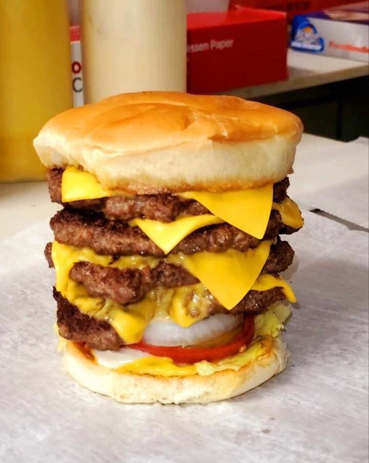 Quadruple Cheese Burger from black owned restaurant Hall of Fame Burgers in Grand Rapids, Michigan