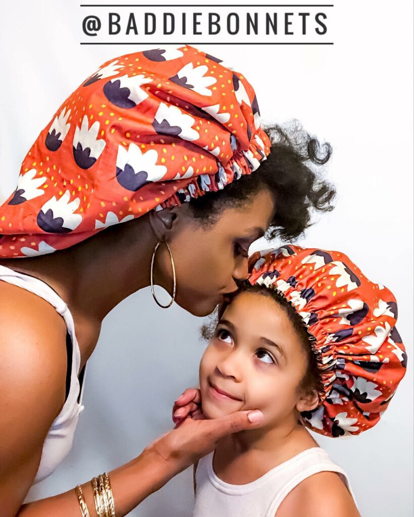 Baddie Bonnets mother and daughter wearing hair bonnets to protect their hair styles