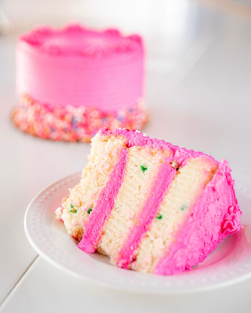 confetti cake with pink icing from cake bar Dallas