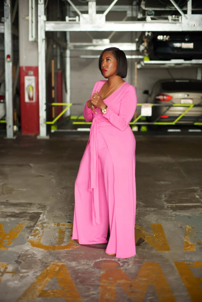 Taylor Jay wearing pink wrap pants from her clothing line