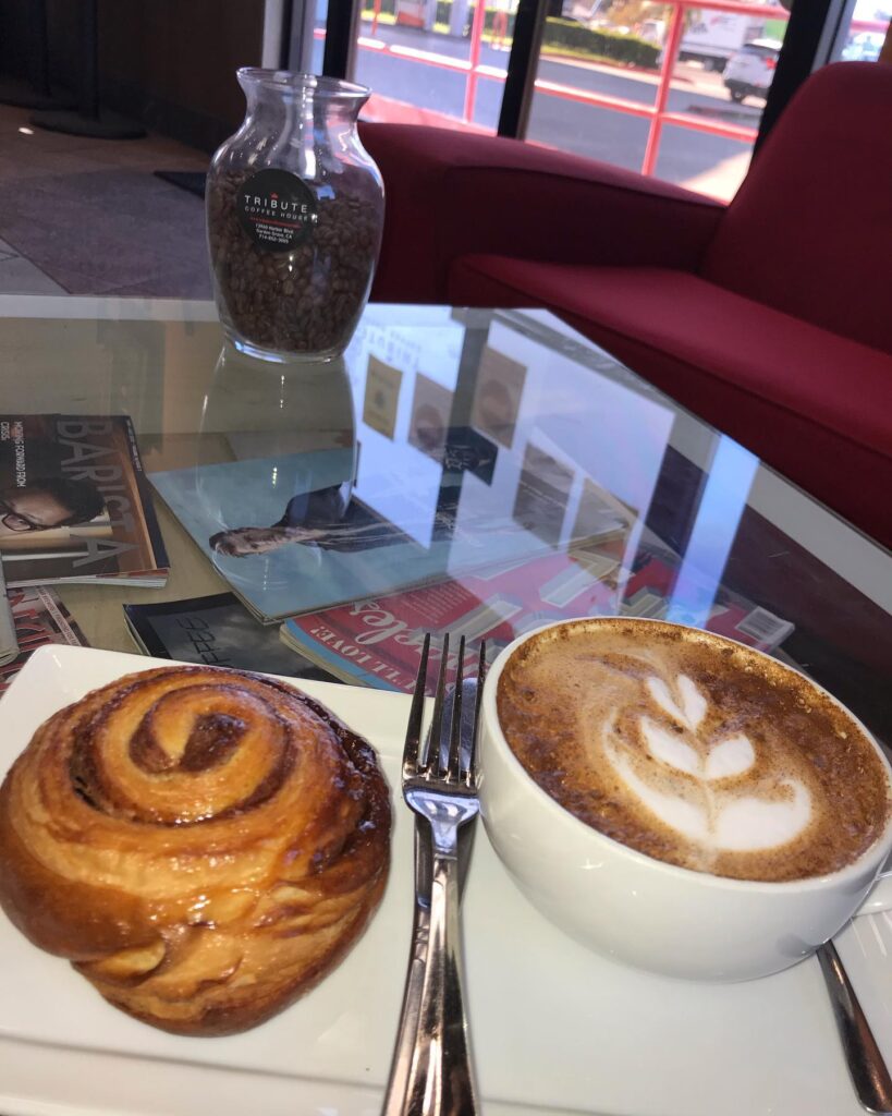 a cinnamon bun and latte from Tribute Coffee House in Anaheim